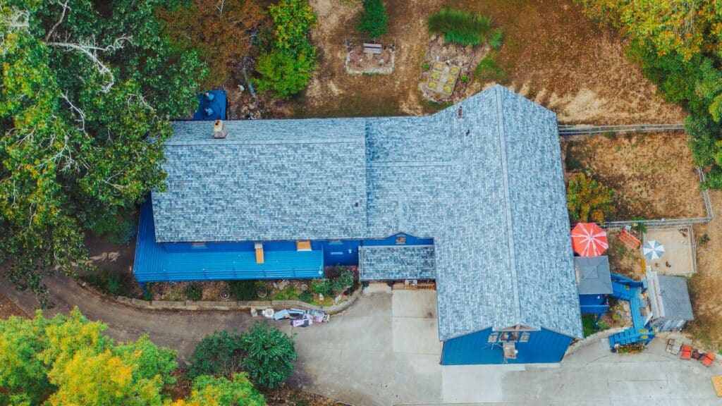 Asbury Roofing New Siding and Shingle Roof Installed