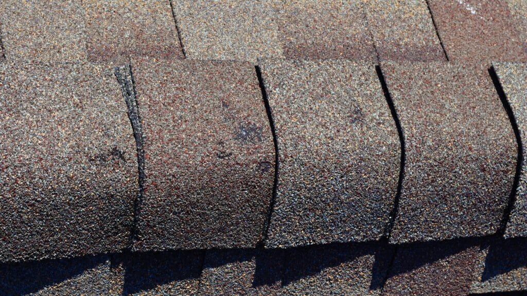 Signs of Hail and Wind Damage What Ohio Homeowners Can Look For Hail Damage Roof Ridge Shingles Asbury Ohio